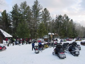 Snowmobiles at Beaver River a few miles south of Robinwood Park. 