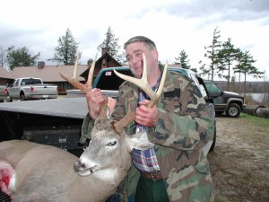 Jayboy with deer at old lodge.